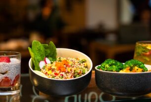 green vegetable in black ceramic bowl